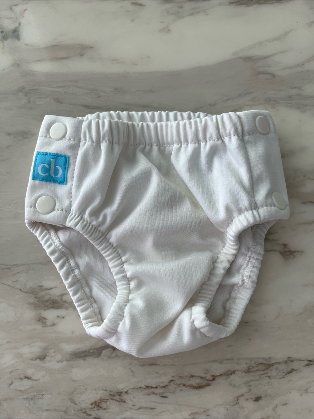 Charlie Banana White Swim Diaper Cover with Blue Logo Patch